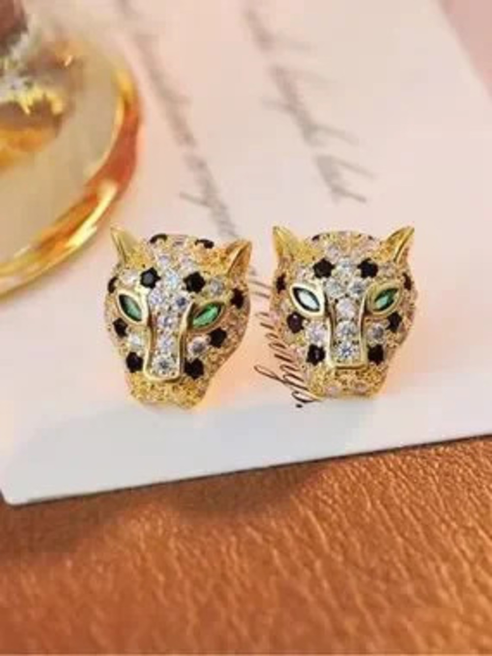Gold Leopard Head Earrings with Green and Black Accents